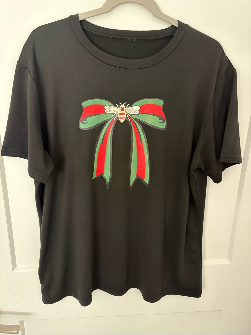 Black Tee with Red & Green Bow and Bee Graphic